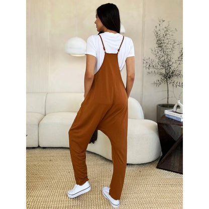 Fullstor jumpsuit med V-ringning