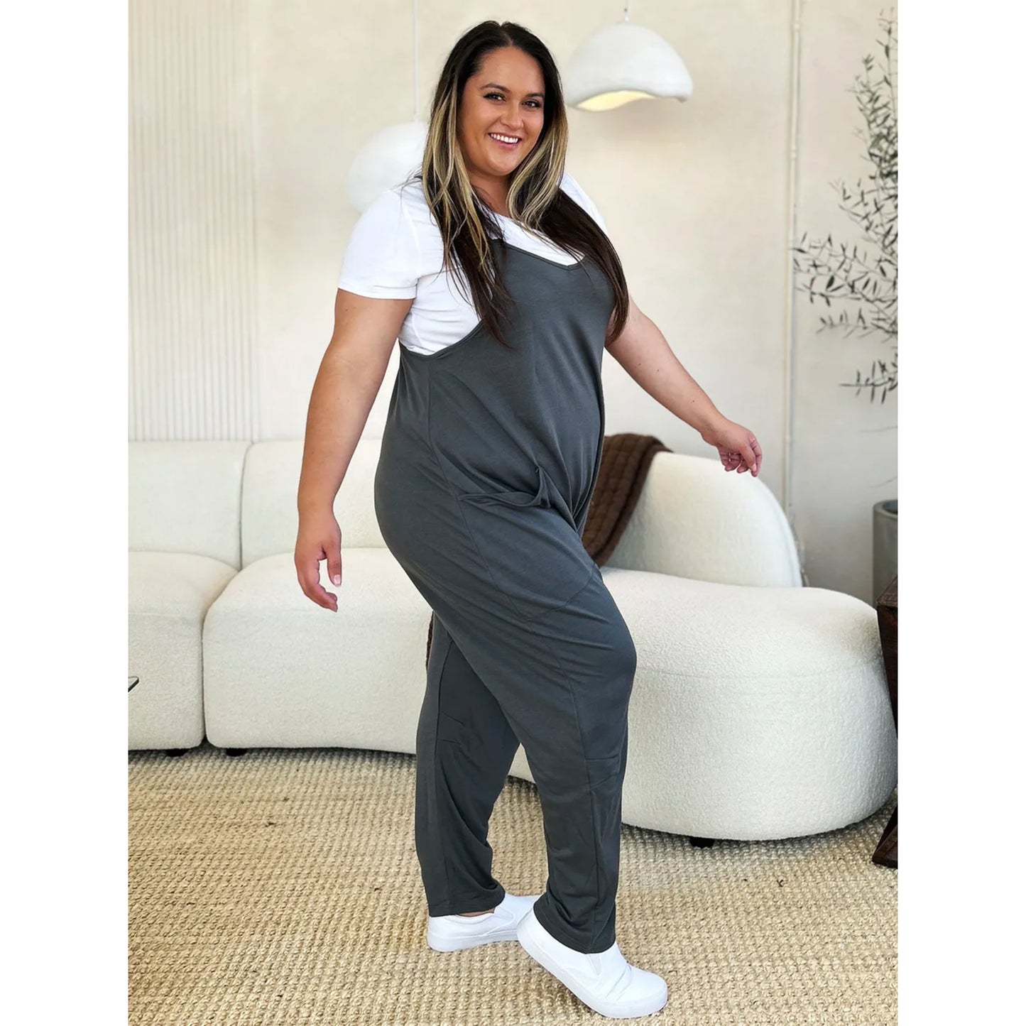 Fullstor jumpsuit med V-ringning