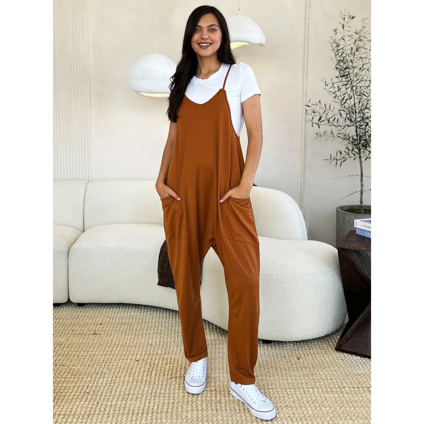 Fullstor jumpsuit med V-ringning