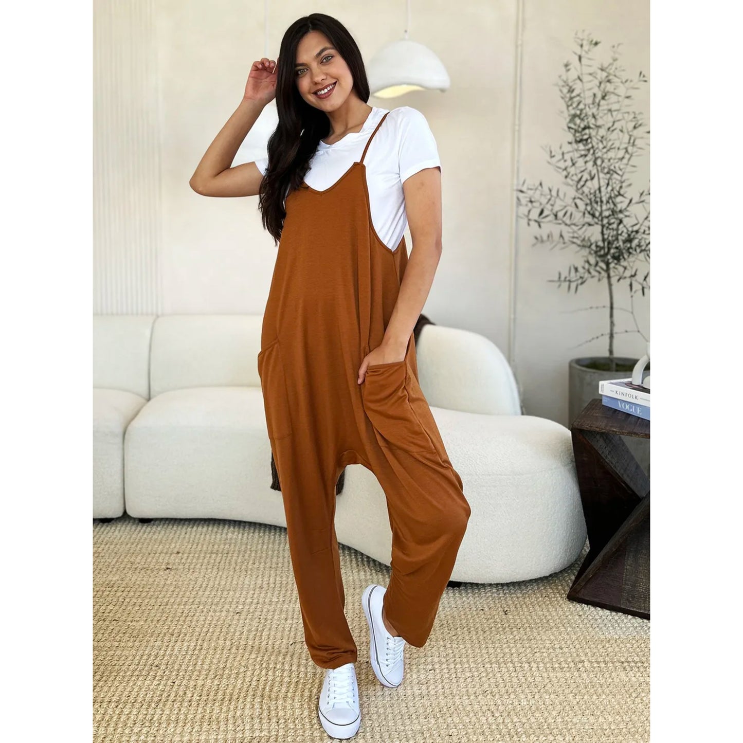 Fullstor jumpsuit med V-ringning