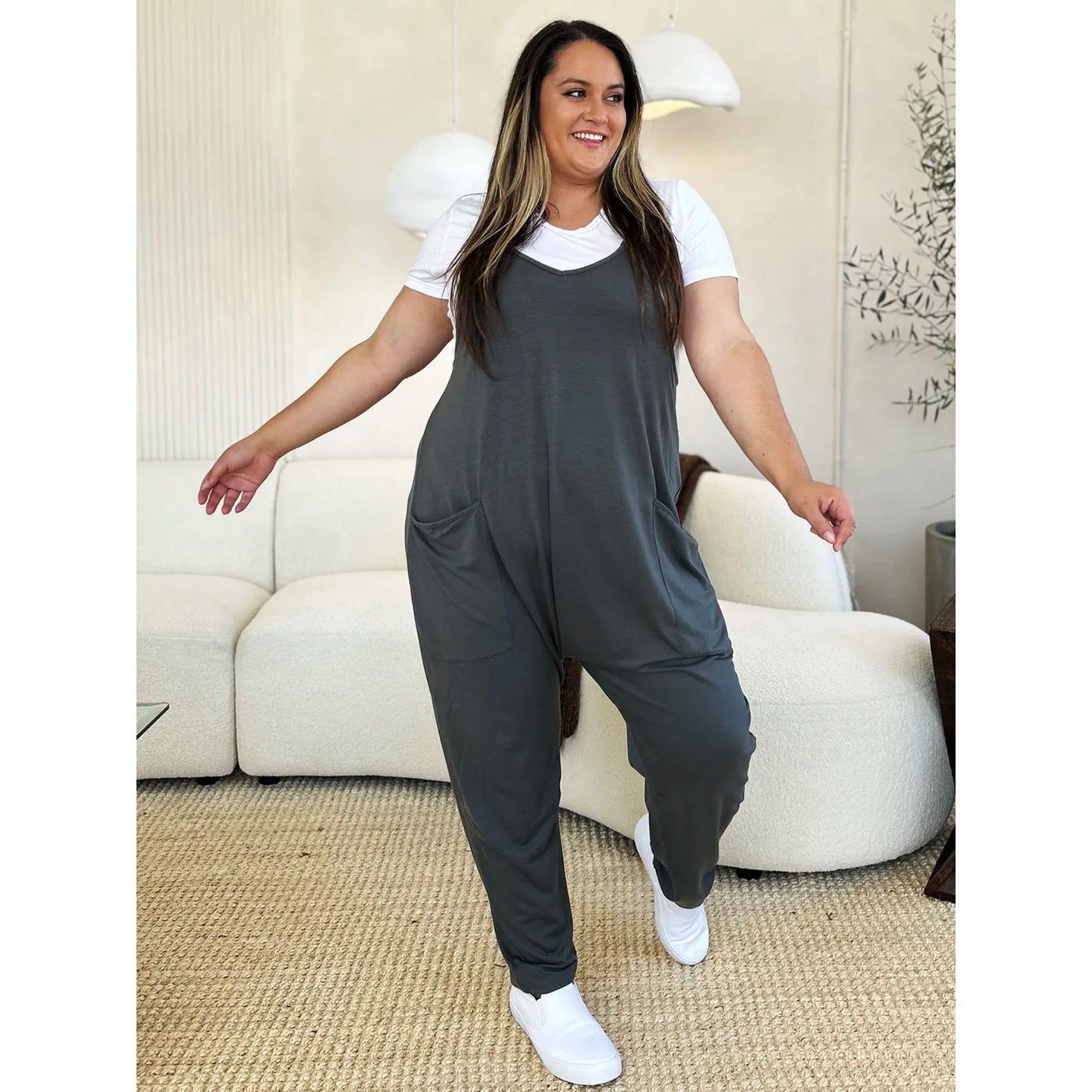 Fullstor jumpsuit med V-ringning