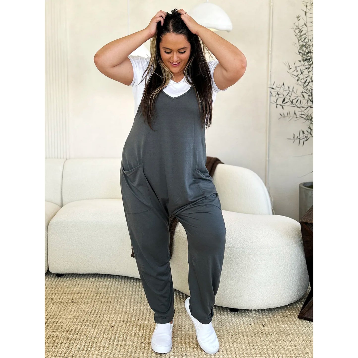 Fullstor jumpsuit med V-ringning