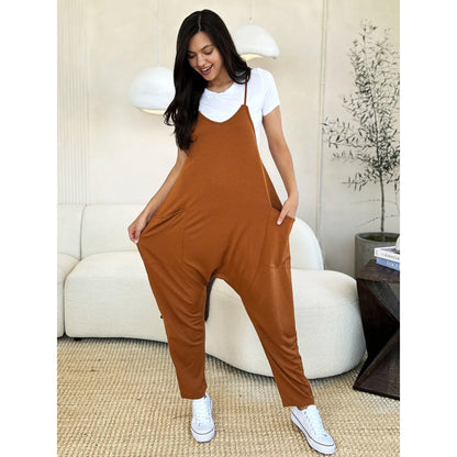 Fullstor jumpsuit med V-ringning